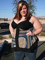 Large and chesty chick Deserie pleasures a black stud with her face hole and fat and wet pussy